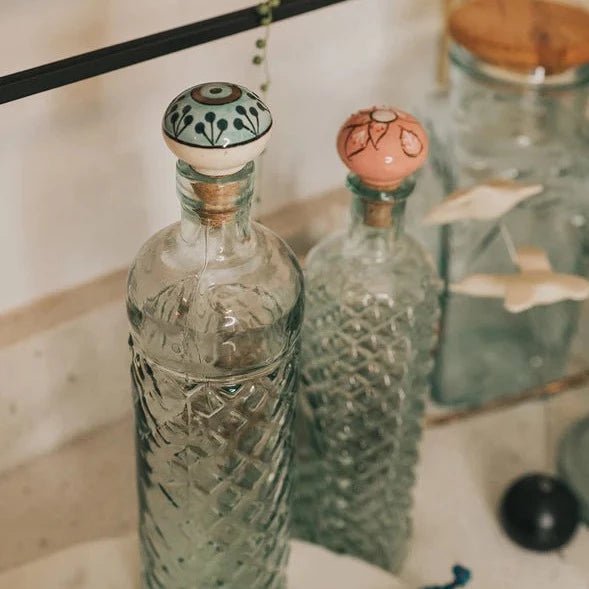 Fair Trade Ceramic and Cork Bottle Stoppers in Glass Bottles. 