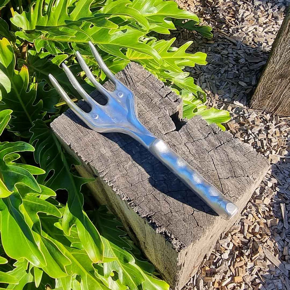 Australian Made Solid Aluminium Garden Cultivator on Block of Wood, Urban Revolution.