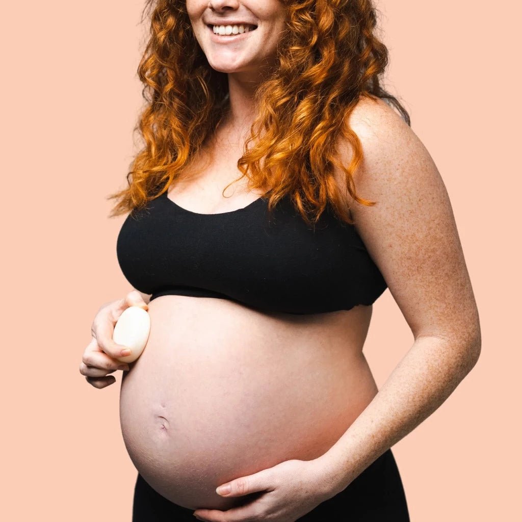 Pregnant Woman using Woohoo &#39;Bestie&#39; Solid Body Moisturiser Bar, Urban Revolution.