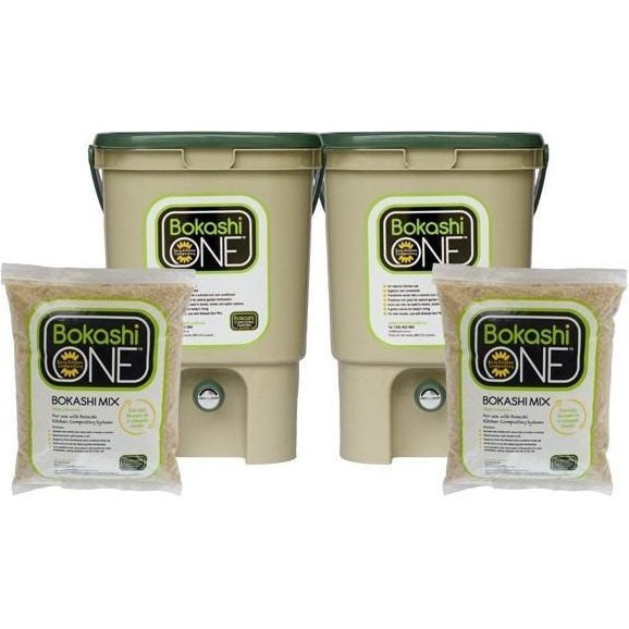 Bokashi Starter Kit Showing Two Tan/Green Buckets and Two Bags of Bran Mix