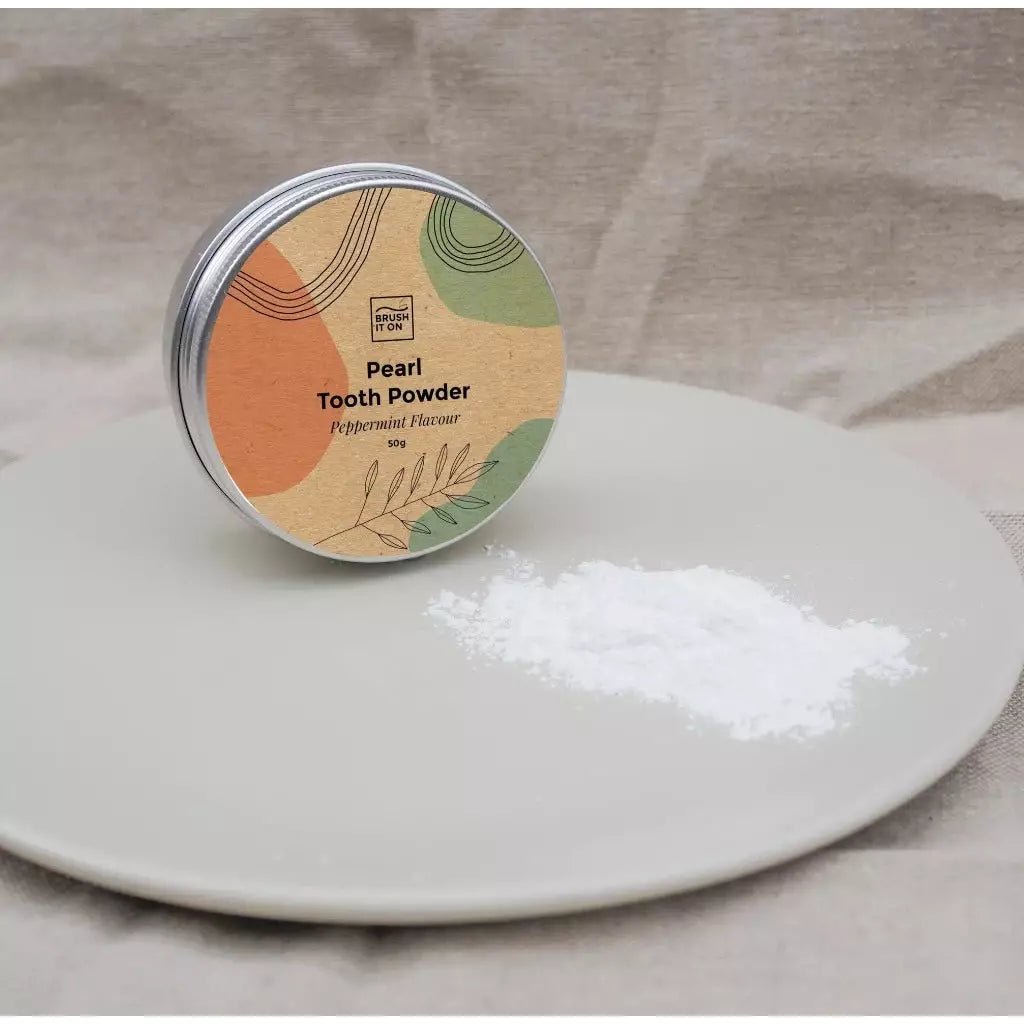 Pearl Tooth Powder in Metal Tin and on Plate 