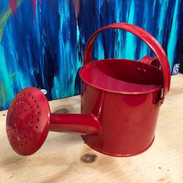 Small Red Children's Watering Can, front view.